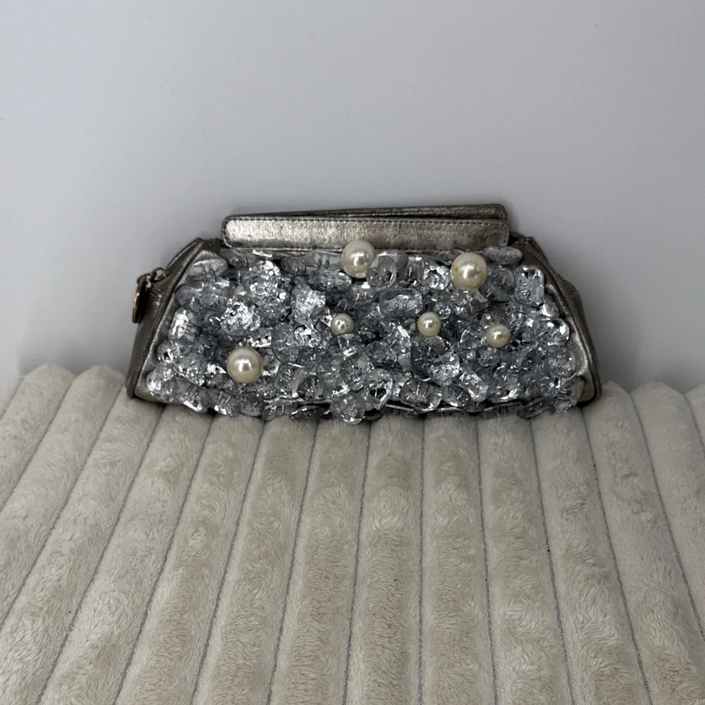 Elegant Silver Clutch with Pearl Accents